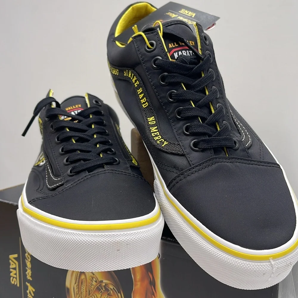 Vans Men’s Old Skool
Cobra Kai Black/Yellow/White 
VN0A3WKT05N
Sneakers - Picture 6 of 16